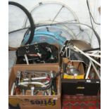 A large quantity of vintage bicycle parts and accessories including luggage bags, mudguards,