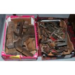 Two boxes of hand tools to include plains, bit and brace etc.