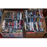 Two boxes of DVD films.