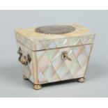 A Victorian parquetry inlaid mother of pearl tea caddy.