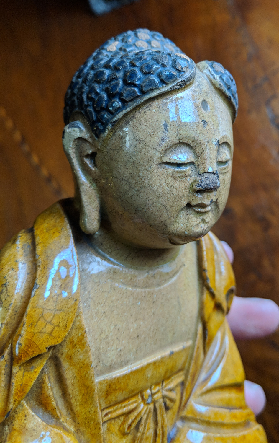 A Chinese earthenware figure of a seated meditating Buddha raised on a lotus plinth and in ochre - Image 3 of 7