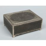 A 19th century Anglo Indian carved ebony and silver mounted casket.