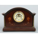 A mahogany cased Ansonia 8 day mantel clock.