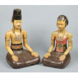 A large pair of Oriental carved polychrome wood figures.