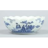 A Japanese fluted Kakiemon blue and white bowl.