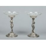 A pair of cut glass and silver plated figural pedestal bon bon dishes,