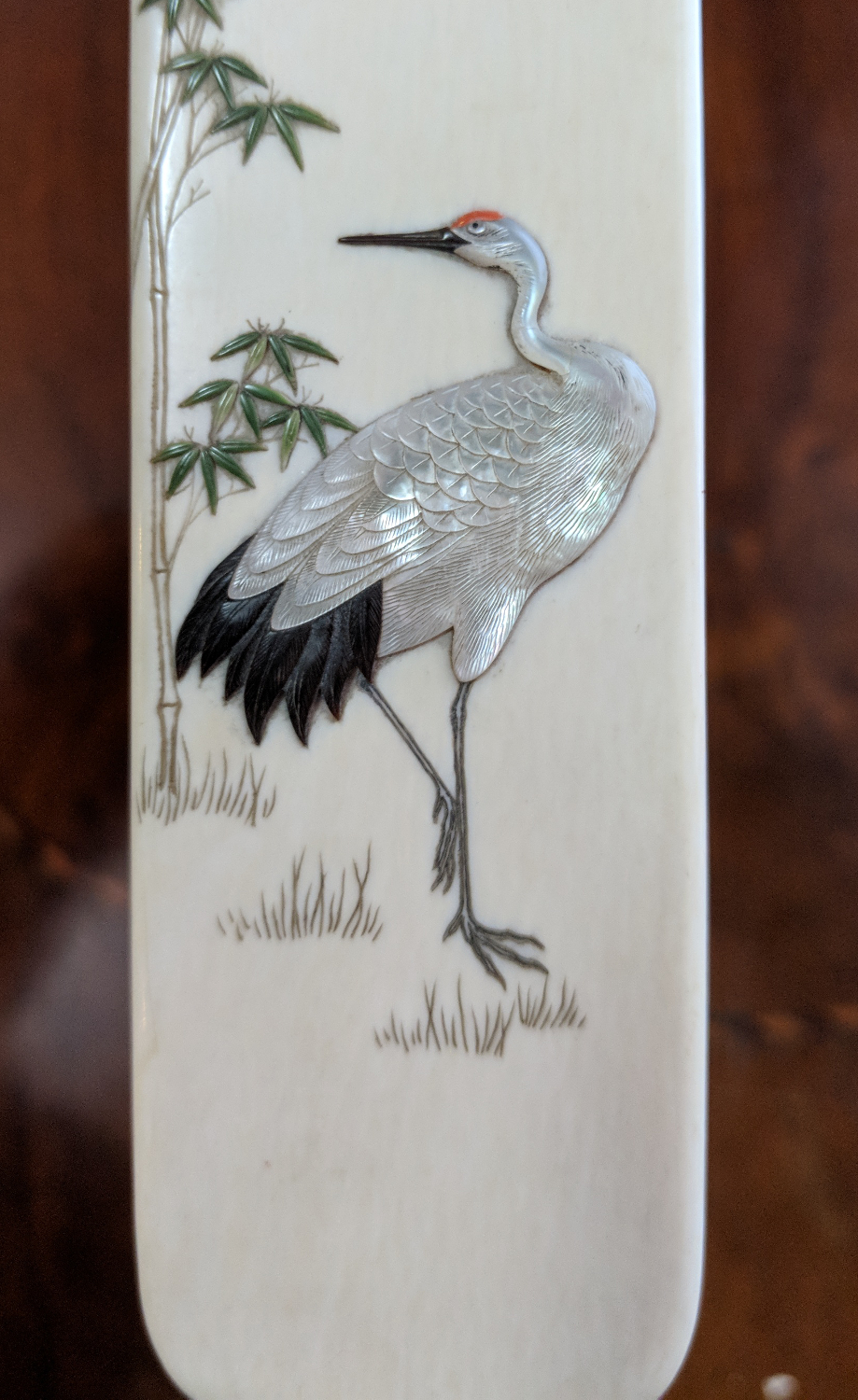 A Japanese Meiji period Shibayama ivory page turner. Decorated with a crane and bamboo soots. - Image 5 of 6