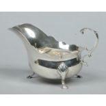 A Victorian silver sauceboat.