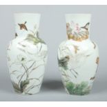 A pair of Japanese Meiji period porcelain mantel vases.