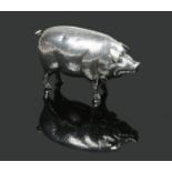 An Edwardian novelty silver vesta case by Adie & Lovekin Ltd. In the form of a pig.