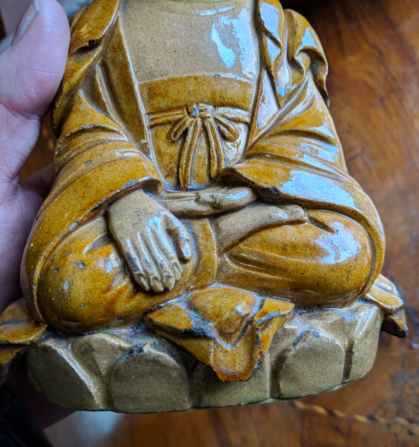 A Chinese earthenware figure of a seated meditating Buddha raised on a lotus plinth and in ochre - Image 5 of 7