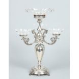 A Victorian silver plated four branch epergne with fluted cut crystal bowls.