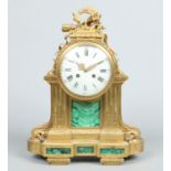 A large early 19th century French gilt bronze and malachite mantel clock of Neo-Classical style.