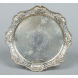 An Edwardian scalloped silver salver by The Alexander Clark Manufacturing Co.