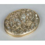 A 19th century Continental silver gilt and gold oval snuff box with hinged cover.