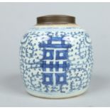 A 17th century Chinese blue and white ginger jar with associated metal cover.