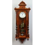 A 19th century walnut cased 8 day Vienna wall clock by Gustav Becker.