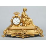 A 19th century French gilt bronze figural mantel clock.