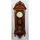 A 19th century Gustav Becker walnut cased Vienna wall clock.