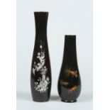 A Japanese lacquered papier mache baluster vase decorated with inlaid mother of pearl along with a