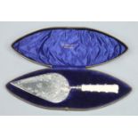 An Edwardian silver and ivory presentation trowel by Lee & Wigfull in fitted case.