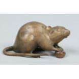 A Japanese Meiji period bronze model of a rat guarding a chestnut, 16cm. Condition Report.