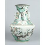 A large 19th century Chinese famille vert arrow vase.