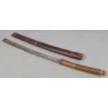 A World War II Burmese Husa Dha sword in wooden scabbard.