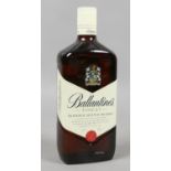 A sealed 1 litre bottle of Ballantines blended Scotch Whisky.
