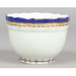 An 18th century Derby sugar bowl with dry blue and gilt borders, puce mark c1790.