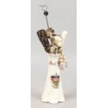 A crested china hat pin holder and collection of vintage hat pins including simulated pearl