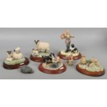 A quantity of ceramic figural groups including Border Fine Arts examples depicting border collie