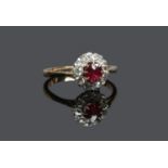 An 18ct gold ruby and diamond coronet cluster ring, size K. Condition Report.