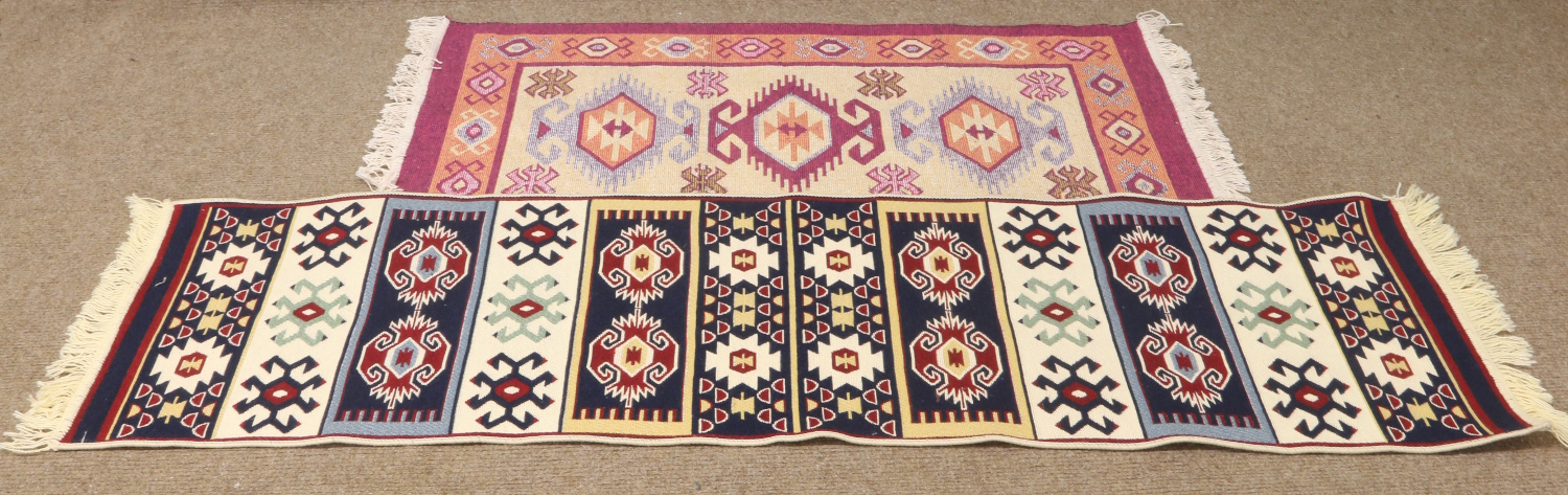 A Turkish runner 182 x 57cm along with a Turkish rug 125 x 80cm both with geometric pattern.