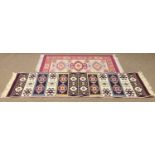 A Turkish runner 182 x 57cm along with a Turkish rug 125 x 80cm both with geometric pattern.