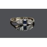 A 9ct gold platinum, diamond and sapphire 3 stone ring, size M.