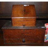 A Victorian pine two handled box with drawer, along with a carved oak stationary box.