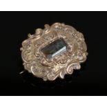 A Victorian pinchbeck brooch set with a moss agate tablet to the centre, brooch 45mm x 38mm,