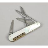 A multi tool folding pocket knife Potter Sheffield, With mother of pearl scales.