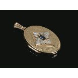 A 9 carat gold locket with sapphire and diamonds.