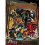 A box of mainly Matchbox Diecast toy vehicles.