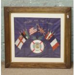 A World War I oak framed silk work picture Victory for the allies,