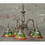 A five branch brushed brass ceiling centre light with coloured glass shade decorated with fruit.