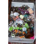 A large box of modern costume jewellery.