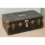 An early 20th century metal bound steamer trunk.