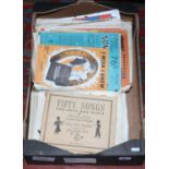 A box of sheet music.