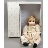 An Ashton-Drake Galleries boxed doll.