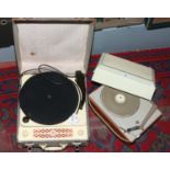 A 1960s Philips portable record player along with a Regentone example in need of repair.