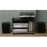 A Sanyo separate stereo system comprising record deck, tuner, stereo cassette deck JPW speakers,