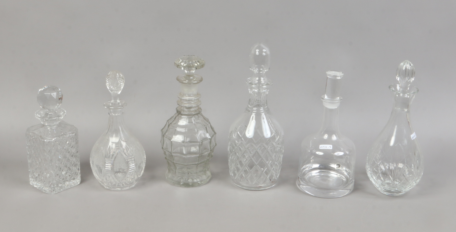 Six glass decanters to include a Dartington and cut glass example.
